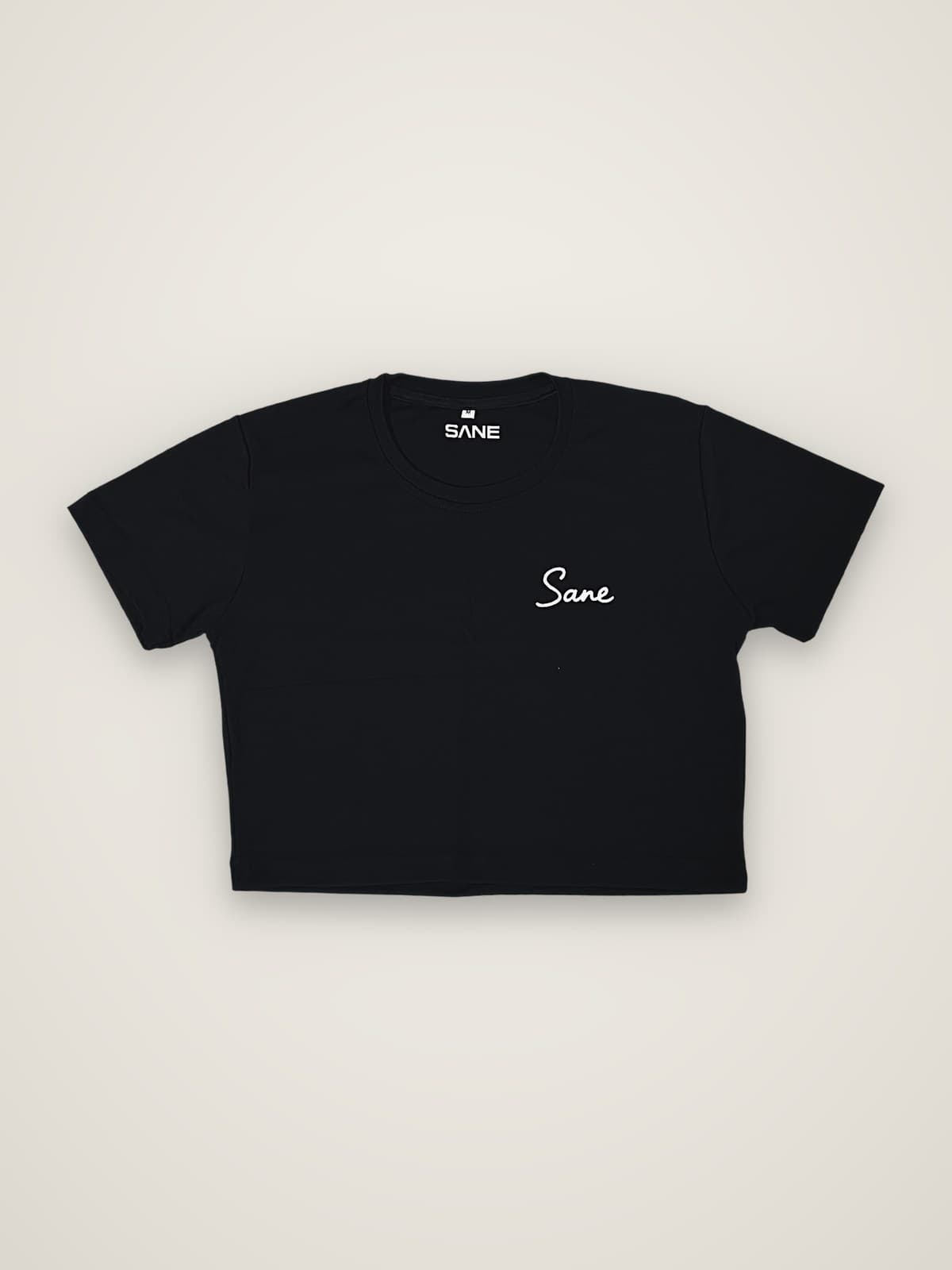 Sane Crop Top in black, front view with Sane script